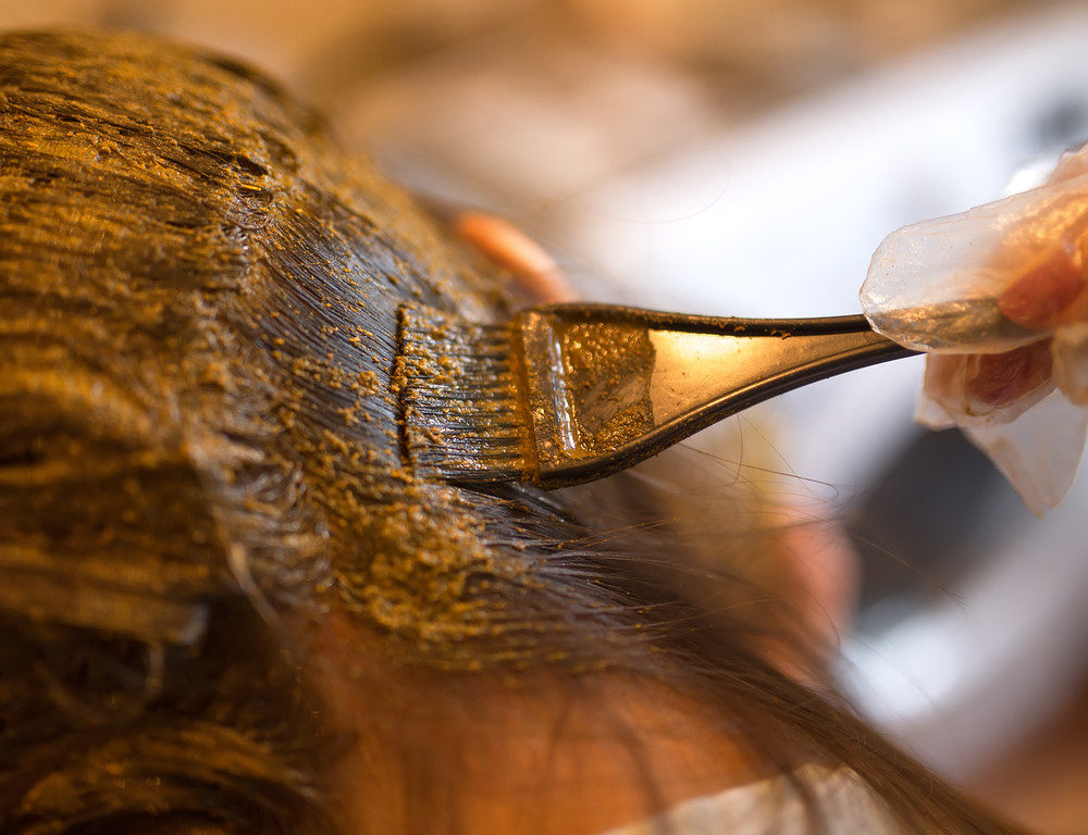 Hair being dyed with henna