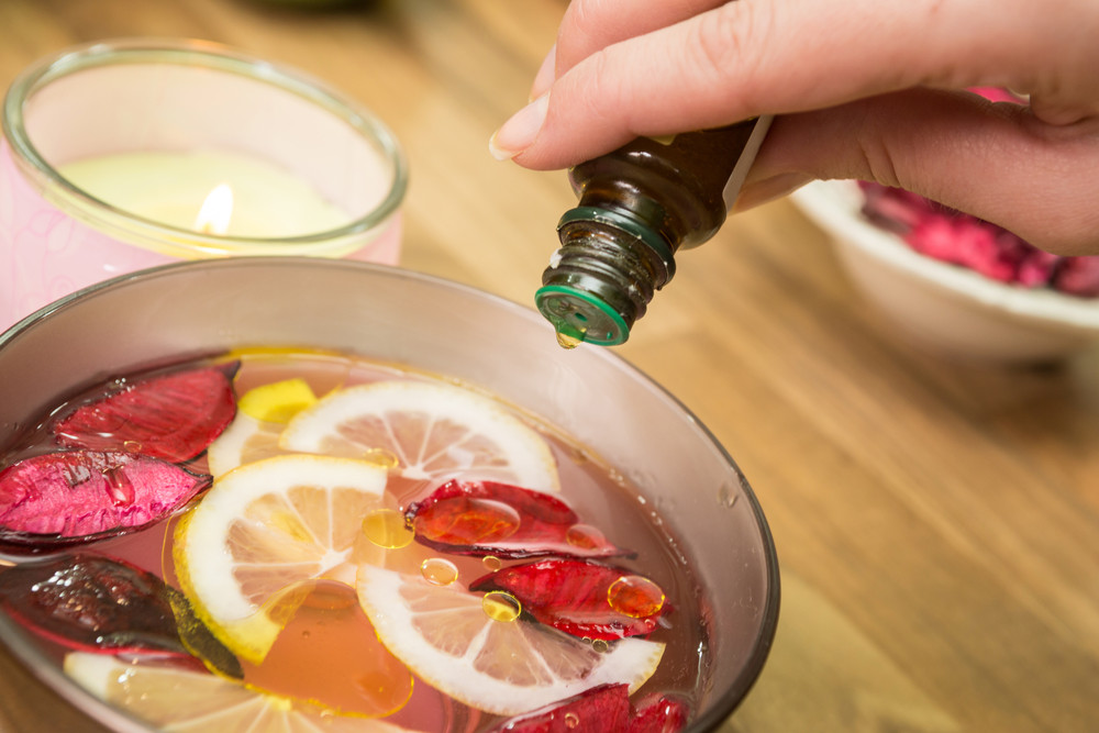 Pouring essential oil